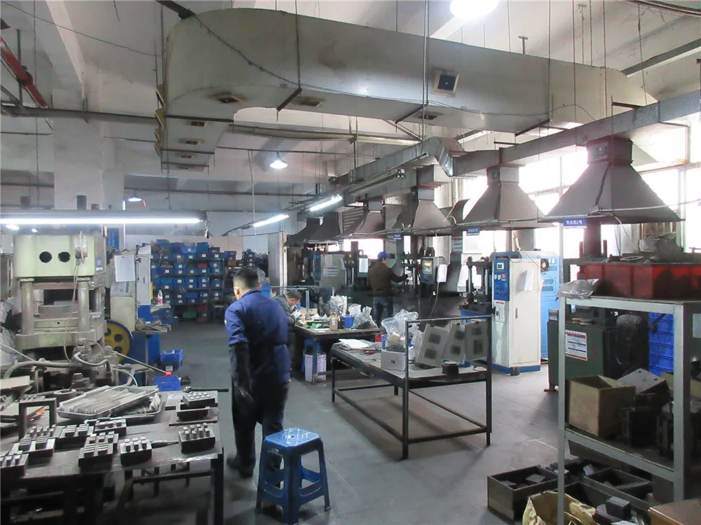 Skilled technicians overseeing diamond wire saw assembly